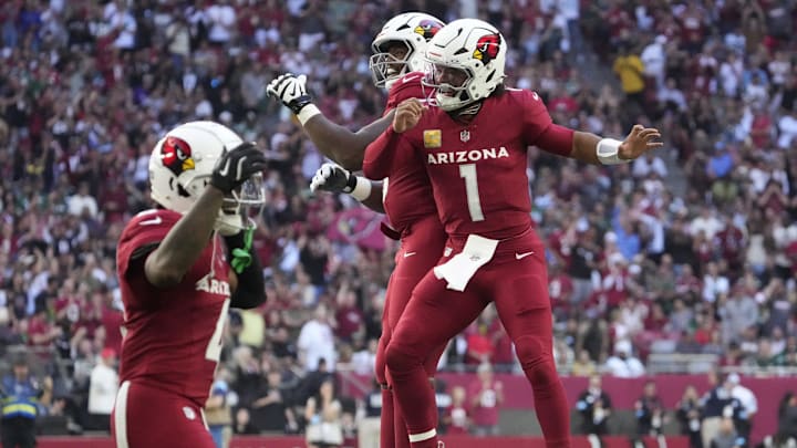 Arizona Cardinals quarterback Kyler Murray (1) celebrates with offensive tackle Kelvin Beachum (68) after a score against the New York Jets during the first quarter at State Farm Stadium on Nov 10, 2024, in Glendale.