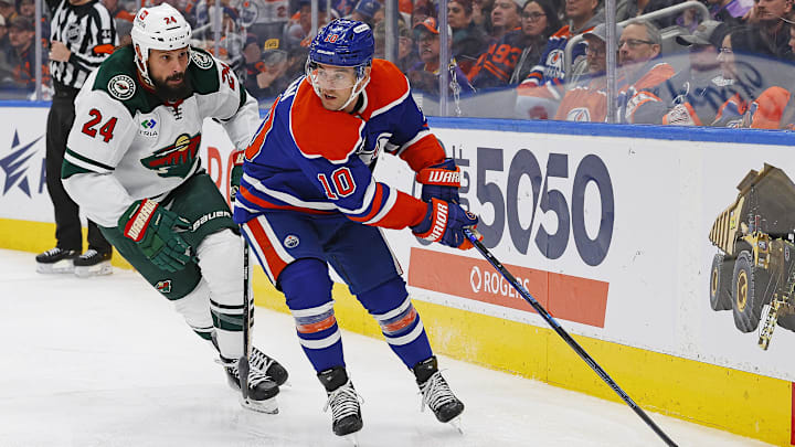 Nov 21, 2024; Edmonton, Alberta, CAN; Edmonton Oilers forward Derek Ryan (10) protects the puck from Minnesota Wild defensemen Zach Bogosian (24) during the third period at Rogers Place. Mandatory Credit: Perry Nelson-Imagn Images Nov 21, 2024; Edmonton, Alberta, CAN; Edmonton Oilers forward Derek Ryan (10) protects the puck from Minnesota Wild defensemen Zach Bogosian (24) during the third period at Rogers Place. Mandatory Credit: Perry Nelson-Imagn Images