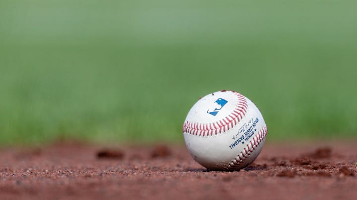 Jul 27, 2025; San Francisco, California, USA; A MLB baseball sits on the infield during the game between the San Francisco Giants and the New York Mets at Oracle Park. Mandatory Credit: Bob Kupbens-Imagn Images