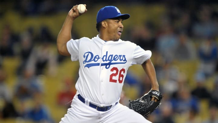 Aug 31, 2010; Los Angeles, CA, USA; Los Angeles Dodgers reliever Octavio Dotel (26) pitches in the ninth inning against the Philadelphia Phillies at Dodger Stadium. The Phillies defeated the Dodgers 8-4. Mandatory Credit: Kirby Lee/Image of Sport-Imagn Images