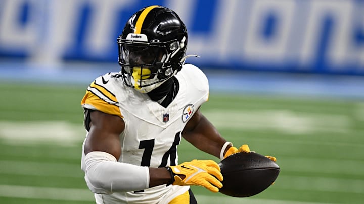 Aug 24, 2024; Detroit, Michigan, USA;  Pittsburgh Steelers wide receiver George Pickens (14) runs upfield after catching a pass against the Detroit Lions in the first quarter at Ford Field. Mandatory Credit: Lon Horwedel-Imagn Images