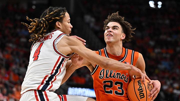 Mar 26, 2026; Houston, TX, USA; Illinois Fighting Illini guard Keaton Wagler (23) dribbles the ball against Houston Cougars guard Kingston Flemings (4) in the second half during a Sweet Sixteen game of the South Regional of the men's 2026 NCAA Tournament at Toyota Center. Mar 26, 2026; Houston, TX, USA; Illinois Fighting Illini guard Keaton Wagler (23) dribbles the ball against Houston Cougars guard Kingston Flemings (4) in the second half during a Sweet Sixteen game of the South Regional of the men's 2026 NCAA Tournament at Toyota Center.