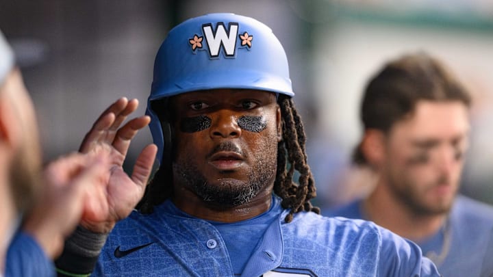 Mar 29, 2025; Washington, District of Columbia, USA; Washington Nationals designated hitter Josh Bell (19) celebrates after scoring a run during the eighth inning against the Philadelphia Phillies at Nationals Park.