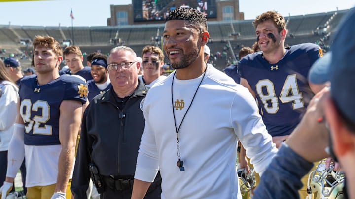 Apr 12, 2025; Notre Dame, IN, USA; Notre Dame Fighting Irish head coach Marcus Freeman smiles as he walks off the field after the Blue-Gold game at Notre Dame Stadium. Mandatory Credit: Michael Caterina-Imagn Images