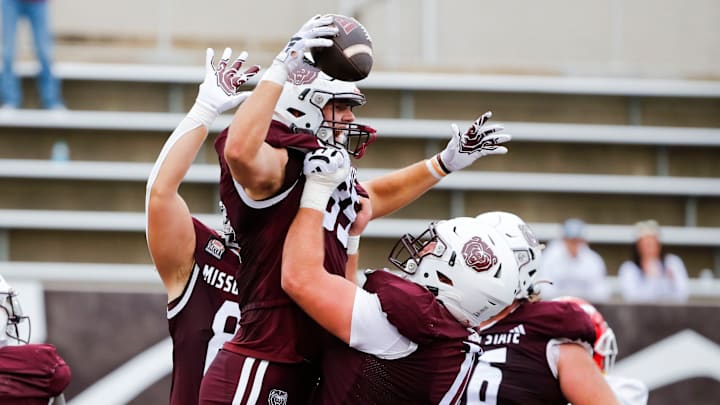 Missouri State Bears tight end Lance Mason (85) (center) is hoisted by teammates after scoring the game winning touchdown on the Youngstown State Penguins at Plaster Stadium on Saturday, Sept. 28, 2024.