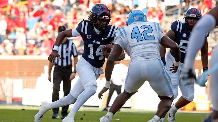 Nov 8, 2025; Oxford, Mississippi, USA; Mississippi Rebels quarterback AJ Maddox (14) runs the ball during the fourth quarter against The Citadel Bulldogs at Vaught-Hemingway Stadium. Mandatory Credit: Petre Thomas-Imagn Images