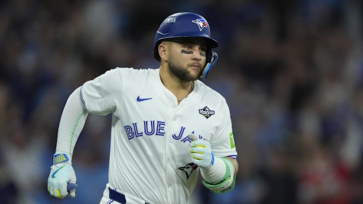 Nov 1, 2025; Toronto, Ontario, CAN; Toronto Blue Jays designated hitter Bo Bichette (11) runs after hitting a three run home run against the Los Angeles Dodgers in the third inning during game seven of the 2025 MLB World Series at Rogers Centre. Mandatory Credit: John E. Sokolowski-Imagn Images Nov 1, 2025; Toronto, Ontario, CAN; Toronto Blue Jays designated hitter Bo Bichette (11) runs after hitting a three run home run against the Los Angeles Dodgers in the third inning during game seven of the 2025 MLB World Series at Rogers Centre. Mandatory Credit: John E. Sokolowski-Imagn Images