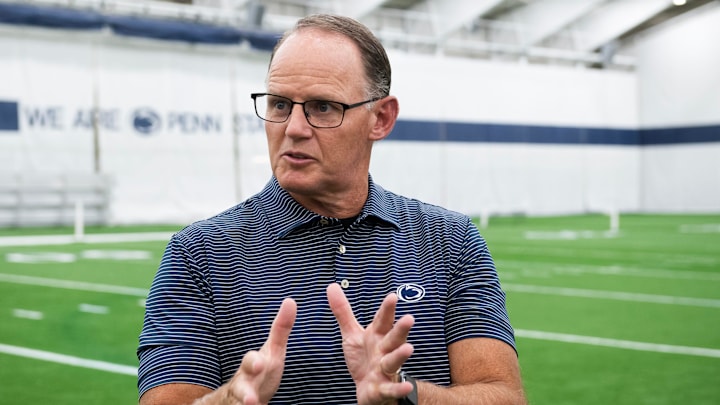 First-year Penn State football defensive coordinator Tom Allen answers a question from a reporter during an interview in Holuba Hall on Thursday, June 13, 2024, in State College.