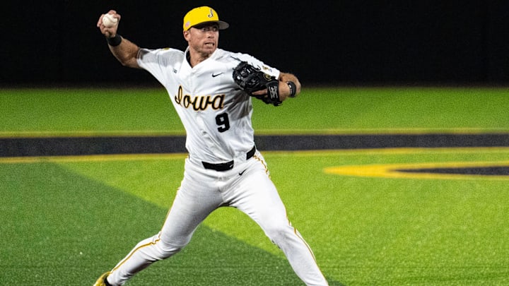 Iowa shortstop Kooper Schulte (9) throws the ball to first base May 1, 2026 during a Big Ten baseball game against the Illinois Fighting Illini at Duane Banks Field in Iowa City, Iowa.