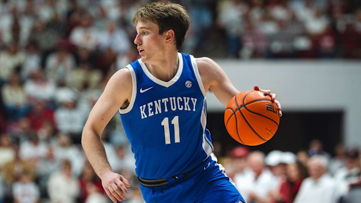 Feb 22, 2025; Tuscaloosa, Alabama, USA; Kentucky Wildcats guard Travis Perry (11) drives the ball against the Alabama Crimson Tide during the first half at Coleman Coliseum. Mandatory Credit: Will McLelland-Imagn Images
