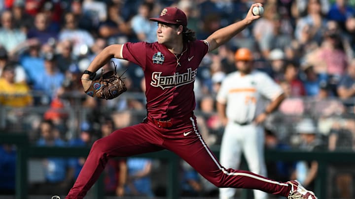 Jun 14, 2024; Omaha, NE, USA;  Florida State Seminoles starting pitcher Jamie Arnold (16) throw against the Tennessee Volunteers during the first inning at Charles Schwab Filed Omaha. 