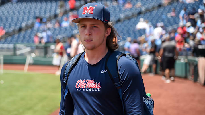 Jun 26, 2022; Omaha, NE, USA; Ole Miss Rebels starting pitcher Hunter Elliott (26) walks to the bullpen to warm up before the game against the Oklahoma Sooners at Charles Schwab Field. Mandatory Credit: Steven Branscombe-Imagn Images Jun 26, 2022; Omaha, NE, USA; Ole Miss Rebels starting pitcher Hunter Elliott (26) walks to the bullpen to warm up before the game against the Oklahoma Sooners at Charles Schwab Field. Mandatory Credit: Steven Branscombe-Imagn Images
