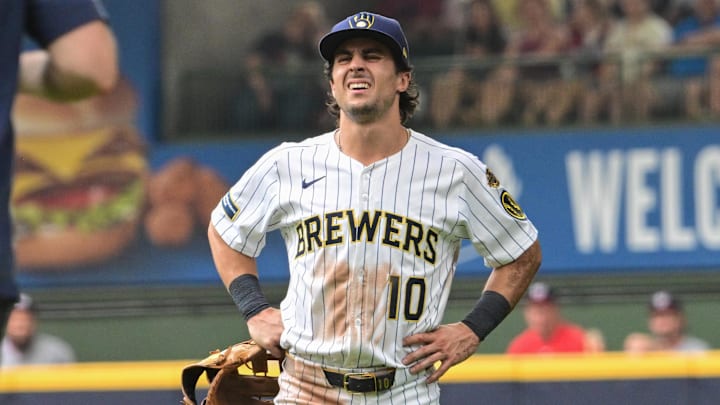 Jul 13, 2025; Milwaukee, Wisconsin, USA;  Milwaukee Brewers right fielder Sal Frelick (10) reacts after suffering an injury in the third inning against the Washington Nationals at American Family Field. Mandatory Credit: Benny Sieu-Imagn Images
