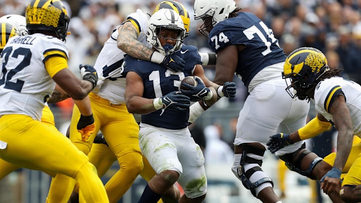 Former Penn State Nittany Lions running back Kaytron Allen (13) runs the ball against the Michigan Wolverines
