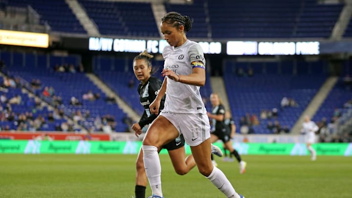 Apr 23, 2022; Harrison, NJ, USA; Orlando Pride forward Darian Jenkins (11) kicks the ball past NJ/NY