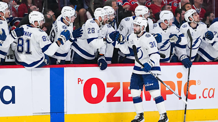 Apr 26, 2026; Montreal, Quebec, CAN; Tampa Bay Lightning left wing Brandon Hagel (38) celebrates his second goal of the game against the Montreal Canadiens with his teammates at the bench during the third period in game four of the first round of the 2026 Stanley Cup Playoffs at Bell Centre. Mandatory Credit: David Kirouac-Imagn Images