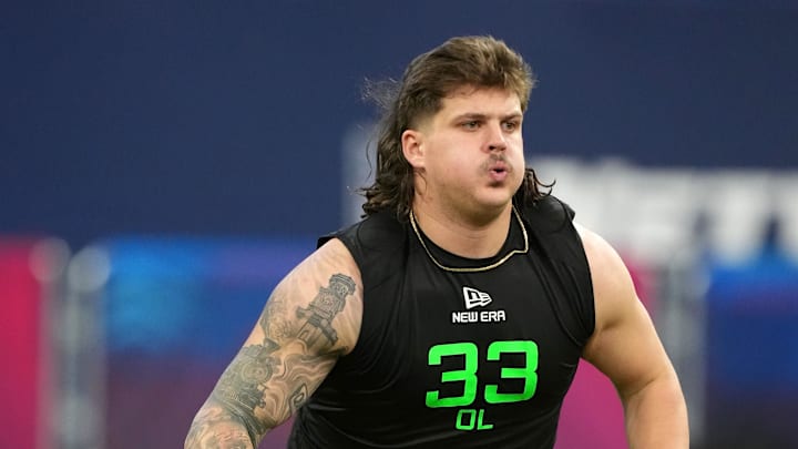 Mar 2, 2025; Indianapolis, IN, USA; Georgia offensive lineman Tate Ratledge (OL33) during the 2025 NFL Scouting Combine at Lucas Oil Stadium. Mandatory Credit: Kirby Lee-Imagn Images Mar 2, 2025; Indianapolis, IN, USA; Georgia offensive lineman Tate Ratledge (OL33) during the 2025 NFL Scouting Combine at Lucas Oil Stadium. Mandatory Credit: Kirby Lee-Imagn Images