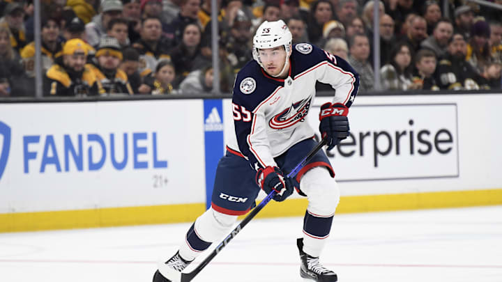 Dec 3, 2023; Boston, Massachusetts, USA; Columbus Blue Jackets defenseman David Jiricek (55) controls the puck during the second period against the Boston Bruins at TD Garden. Mandatory Credit: Bob DeChiara-Imagn Images
