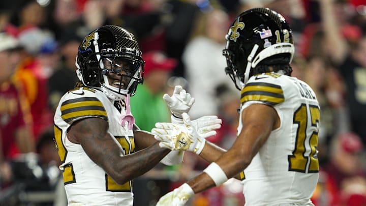 Oct 7, 2024; Kansas City, Missouri, USA; New Orleans Saints wide receiver Rashid Shaheed (22) celebrates with wide receiver Chris Olave (12) after scoring a touchdown during the first half against the Kansas City Chiefs at GEHA Field at Arrowhead Stadium. Mandatory Credit: Jay Biggerstaff-Imagn Images Oct 7, 2024; Kansas City, Missouri, USA; New Orleans Saints wide receiver Rashid Shaheed (22) celebrates with wide receiver Chris Olave (12) after scoring a touchdown during the first half against the Kansas City Chiefs at GEHA Field at Arrowhead Stadium. Mandatory Credit: Jay Biggerstaff-Imagn Images
