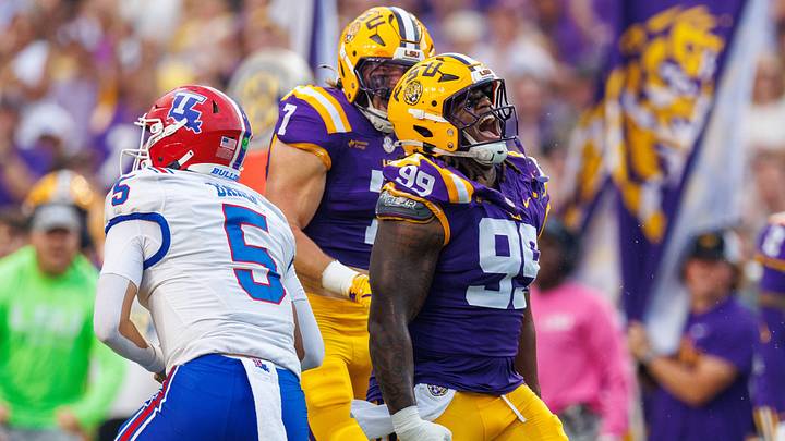Sep 12, 2026; Baton Rouge, Louisiana, USA; LSU Tigers defensive tackle Deuce Geralds (99) reacts to sacking Louisiana Tech Bulldogs quarterback Blake Baker (5) during the first half at Tiger Stadium. Mandatory Credit: Stephen Lew-Imagn Images Sep 12, 2026; Baton Rouge, Louisiana, USA; LSU Tigers defensive tackle Deuce Geralds (99) reacts to sacking Louisiana Tech Bulldogs quarterback Blake Baker (5) during the first half at Tiger Stadium. Mandatory Credit: Stephen Lew-Imagn Images