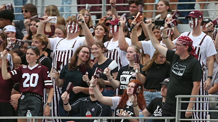 Sep 6, 2025; Starkville, Mississippi, USA; Mississippi State Bulldogs fans ring their cowbells during warm ups prior to the game against the Arizona State Sun Devils at Davis Wade Stadium at Scott Field. Mandatory Credit: Petre Thomas-Imagn Images