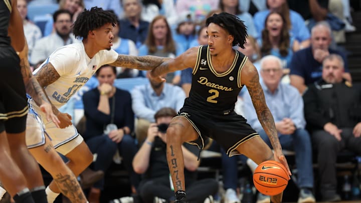Jan 10, 2026; Chapel Hill, North Carolina, USA; Wake Forest Demon Deacons forward Juke Harris (2) battles for position against the North Carolina Tar Heels during the second half at Dean E. Smith Center. Mandatory Credit: Cory Knowlton-Imagn Images