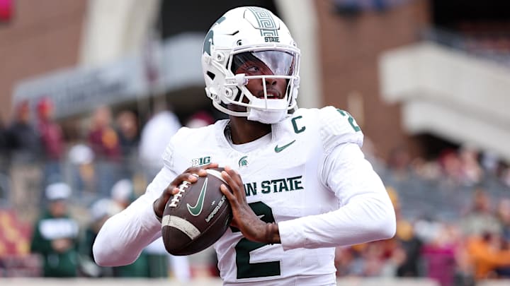Nov 1, 2025; Minneapolis, Minnesota, USA; Michigan State Spartans quarterback Aidan Chiles (2) warms up before the game against the Minnesota Golden Gophers at Huntington Bank Stadium. Mandatory Credit: Matt Krohn-Imagn Images