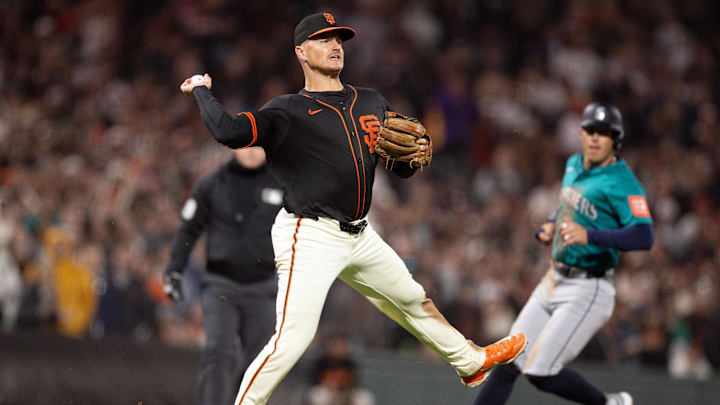 Apr 5, 2025; San Francisco, California, San Francisco Giants third baseman Matt Chapman (26) leaves his feet to throw out Seattle Mariners shortstop J.P. Crawford at first base for a the final out during the ninth inning at Oracle Park. 