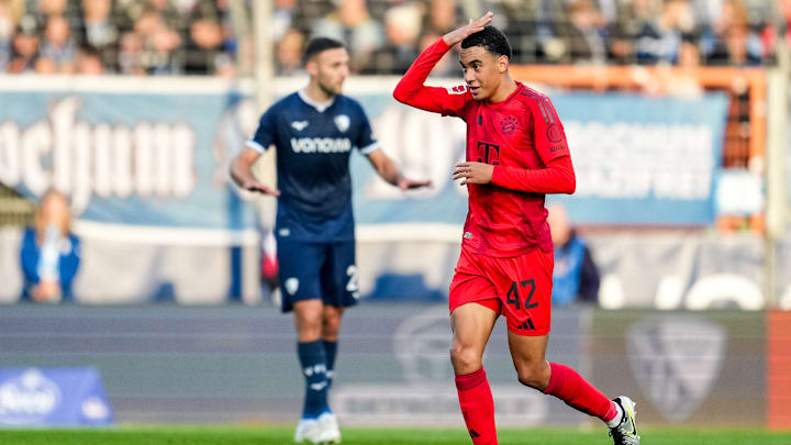 Jamal Musiala celebrating after scoring a header for Bayern Munich against VfL Bochum on matchday 8 of the Bundesliga.