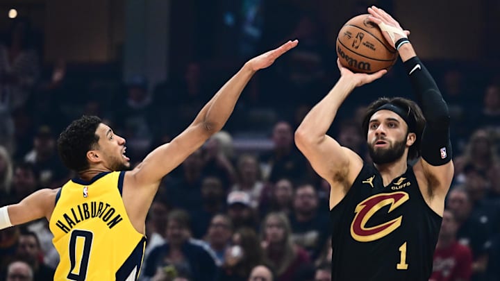 May 13, 2025; Cleveland, Ohio, USA; Cleveland Cavaliers guard Max Strus (1) shoots over the defense of Indiana Pacers guard Tyrese Haliburton (0) during the first quarter of game five of the second round for the 2025 NBA Playoffs at Rocket Arena. Mandatory Credit: Ken Blaze-Imagn Images May 13, 2025; Cleveland, Ohio, USA; Cleveland Cavaliers guard Max Strus (1) shoots over the defense of Indiana Pacers guard Tyrese Haliburton (0) during the first quarter of game five of the second round for the 2025 NBA Playoffs at Rocket Arena. Mandatory Credit: Ken Blaze-Imagn Images