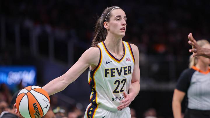 Indiana Fever guard Caitlin Clark (22) passes the ball Indiana Fever guard Caitlin Clark (22) passes the ball