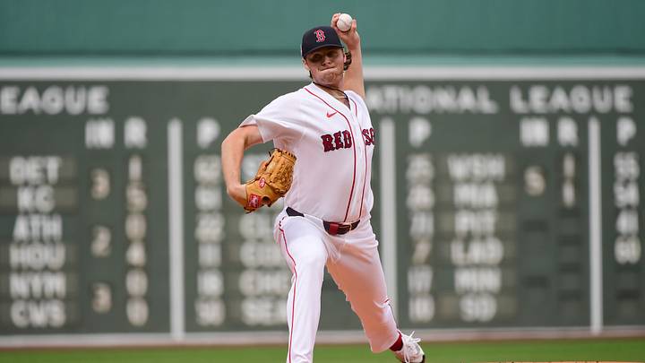 Aug 23, 2026; Boston, Massachusetts, USA;  Boston Red Sox pitcher Jake Bennett (64) pitches during the first inning against the San Francisco Giants at Fenway Park. Mandatory Credit: Bob DeChiara-Imagn Images