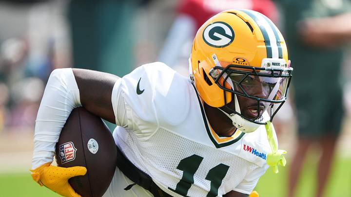 Green Bay Packers wide receiver Jayden Reed (11) participates in a drill during the sixth day of training camp on Aug. 4, 2026