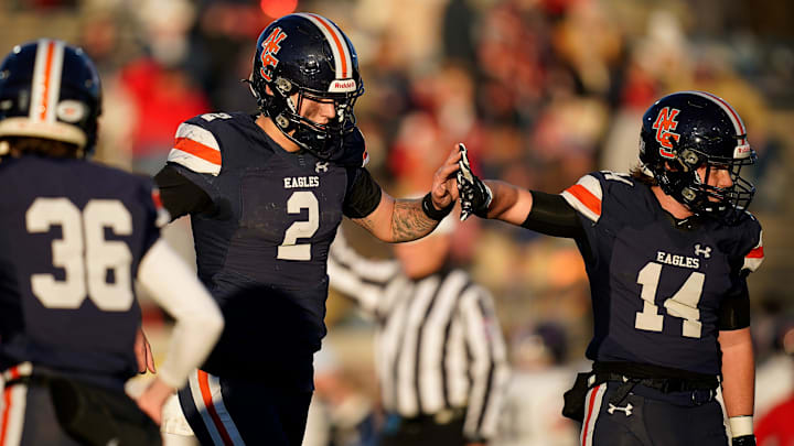 Nashville Christian's Jared Curtis (2) celebrates his touchdown against Columbia Academy with Zane Crampton (14) during the third quarter of the Division II-A championship game at Finley Stadium in Chattanooga, Tenn., Thursday, Dec. 5, 2024.