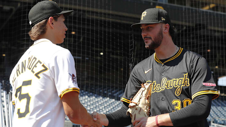 Jul 22, 2025; Pittsburgh, Pennsylvania, USA; Seth Hernandez (left), the Pittsburgh Pirates' first-round and sixth-overall pick in the 2025 first-year player draft, talks with Pirates pitcher Paul Skenes (30) before the game against the Detroit Tigers at PNC Park. Mandatory Credit: Charles LeClaire-Imagn Images Jul 22, 2025; Pittsburgh, Pennsylvania, USA; Seth Hernandez (left), the Pittsburgh Pirates' first-round and sixth-overall pick in the 2025 first-year player draft, talks with Pirates pitcher Paul Skenes (30) before the game against the Detroit Tigers at PNC Park. Mandatory Credit: Charles LeClaire-Imagn Images