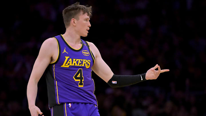 Apr 4, 2025; Los Angeles, California, USA;  Los Angeles Lakers guard Dalton Knecht (4) reacts after a 3-point basket in the first half against the New Orleans Pelicans at Crypto.com Arena. Mandatory Credit: Jayne Kamin-Oncea-Imagn Images