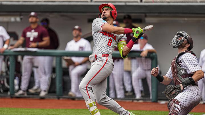 Jun 7, 2026; Athens, GA, USA; Georgia Bulldogs infielder Rylan Lujo (8) drives in a run with a sacrifice fly ball against the Mississippi State Bulldogs during the first inning at Foley Field. Mandatory Credit: Dale Zanine-Imagn Images