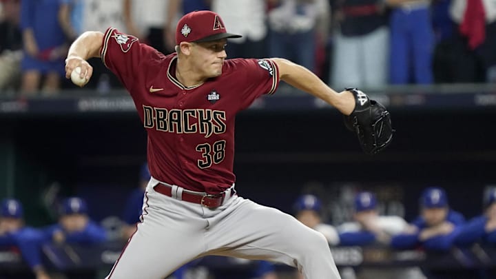 Oct 27, 2023; Arlington, TX, USA; Arizona Diamondbacks pitcher Paul Sewald (38) throws during the ninth inning in game one of the 2023 World Series against the Texas Rangers at Globe Life Field. Mandatory Credit: Raymond Carlin III-Imagn Images
