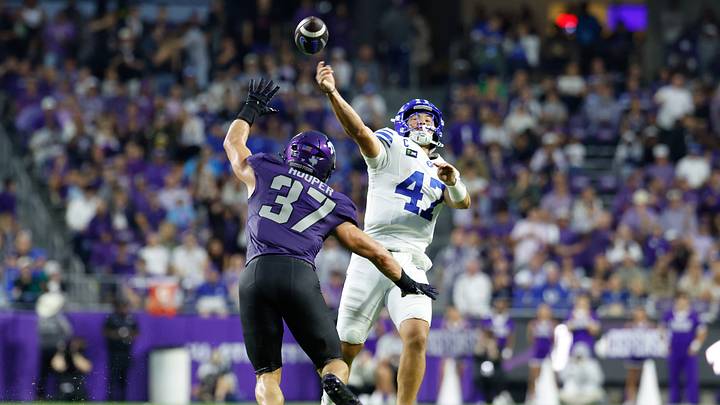Oct 3, 2026; Fort Worth, Texas, USA;  BYU Cougars quarterback Bear Bachmeier (47) throws a pass while being pressured by TCU Horned Frogs linebacker Hudson Hooper (37) during the first half at Amon G. Carter Stadium.  Mandatory Credit: Chris Jones-Imagn Images