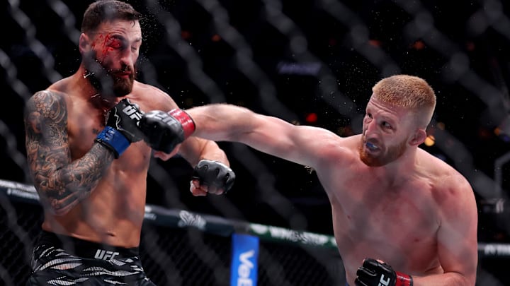 Bo Nickal (red gloves) fights Paul Craig in the middleweight bout during UFC 309 at Madison Square Garden.