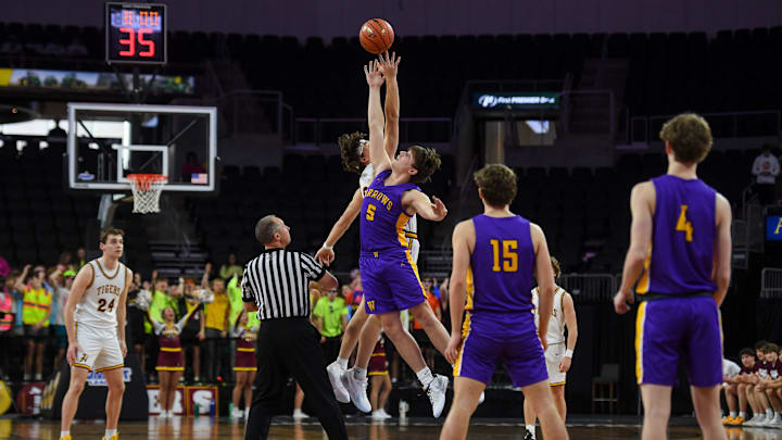 Harrisburg and Watertown boys basketball tip off their game during the SDHSAA quarterfinals on Thursday, March 14, 2024 at Denny Sanford Premier Center in Sioux Falls. Harrisburg and Watertown boys basketball tip off their game during the SDHSAA quarterfinals on Thursday, March 14, 2024 at Denny Sanford Premier Center in Sioux Falls.