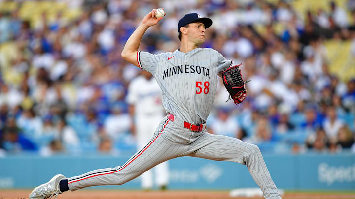 Jul 21, 2025; Los Angeles, California, USA; Minnesota Twins pitcher David Festa (58) throws against the Los Angeles Dodgers during the first inning at Dodger Stadium. Jul 21, 2025; Los Angeles, California, USA; Minnesota Twins pitcher David Festa (58) throws against the Los Angeles Dodgers during the first inning at Dodger Stadium.