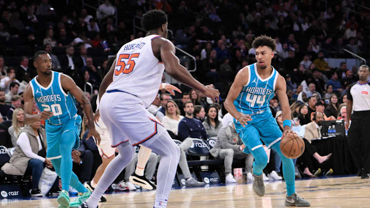 Oct 15, 2024; New York, New York, USA; Charlotte Hornets guard Charlie Brown Jr. (44) drives to the basket while being defended by New York Knicks center Ariel Hukporti (55) during the second half at Madison Square Garden. Mandatory Credit: John Jones-Imagn Images Oct 15, 2024; New York, New York, USA; Charlotte Hornets guard Charlie Brown Jr. (44) drives to the basket while being defended by New York Knicks center Ariel Hukporti (55) during the second half at Madison Square Garden. Mandatory Credit: John Jones-Imagn Images