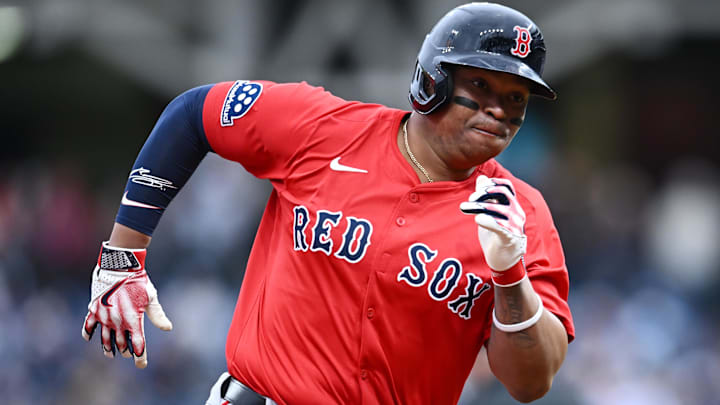 Apr 26, 2025; Cleveland, OH, USA; Boston Red Sox designated hitter Rafael Devers (11) rounds third base en route to scoring during the first inning against the Cleveland Guardians at Progressive Field. Mandatory Credit: Ken Blaze-Imagn Images