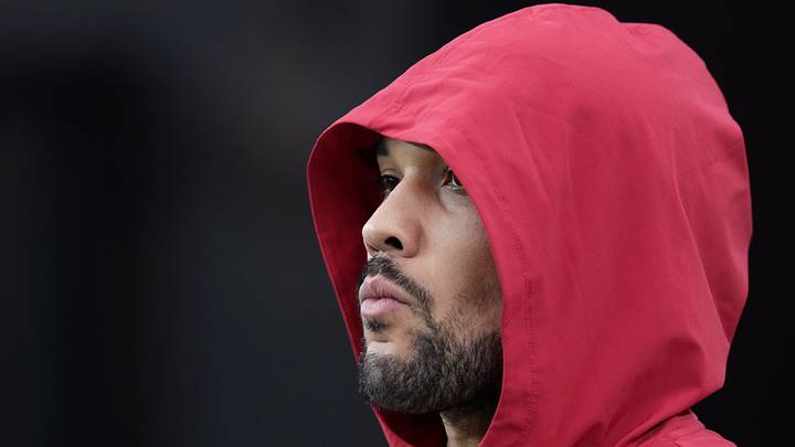 Arizona Cardinals running back James Conner watches his teammates warm up to play the Jacksonville Jaguars at State Farm Stadium on Nov. 23, 2025.