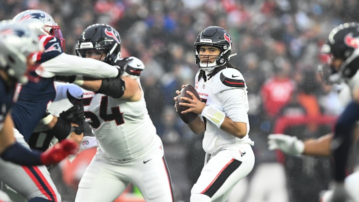 Jan 18, 2026; Foxborough, MA, USA; Houston Texans quarterback C.J. Stroud (7) looks to throw in the first quarter against the New England Patriots in an AFC Divisional Round game at Gillette Stadium. Mandatory Credit: Brian Fluharty-Imagn Images