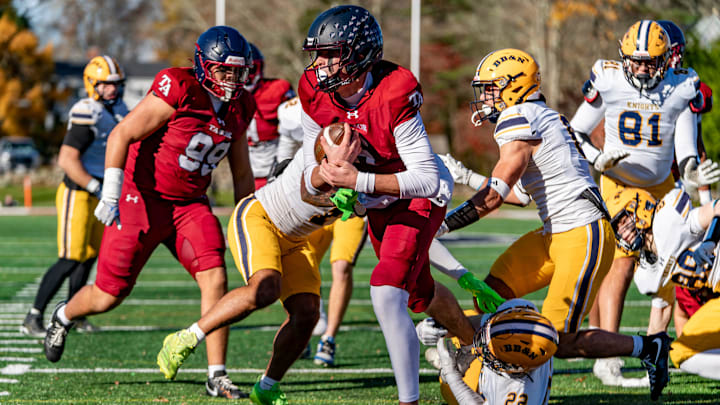 Tabor Academy's quarterback Peter Bourque runs in a touchdown on the opening drive against the BB&N Knights . JOSH SOUZA/STANDARD-TIMES SPECIAL