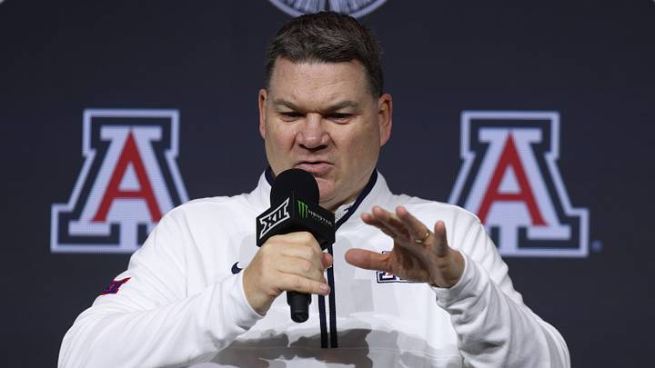 Oct 21, 2026; Kansas City, MO, USA; Arizona coach Tommy Lloyd is interviewed during the Big 12 Media Days at T-Mobile Center. Oct 21, 2026; Kansas City, MO, USA; Arizona coach Tommy Lloyd is interviewed during the Big 12 Media Days at T-Mobile Center.