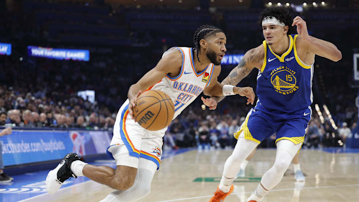 Mar 7, 2026; Oklahoma City, Oklahoma, USA; Oklahoma City Thunder guard Isaiah Joe (11) drives past Golden State Warriors forward Gui Santos (15) during the first half at Paycom Center. Mandatory Credit: Alonzo Adams-Imagn Images Mar 7, 2026; Oklahoma City, Oklahoma, USA; Oklahoma City Thunder guard Isaiah Joe (11) drives past Golden State Warriors forward Gui Santos (15) during the first half at Paycom Center. Mandatory Credit: Alonzo Adams-Imagn Images
