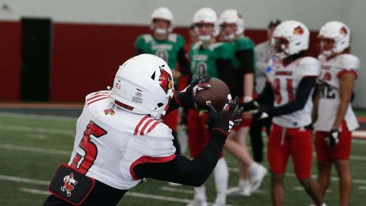 Louisville’s Caullin Lacy (5) catches the ball during Spring Practice on Thursday, April 4, 2024
